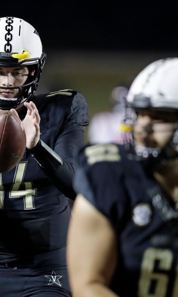 Vandy keeps bowl hopes alive, edging Ole Miss 36-29 in OT